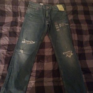 Levi 511 distressed jeans